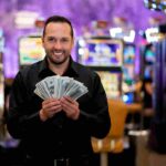 Player celebrating a win with free coins in Cashman Casino.