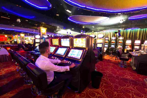 Brightly lit slot machines at Funrise Casino.